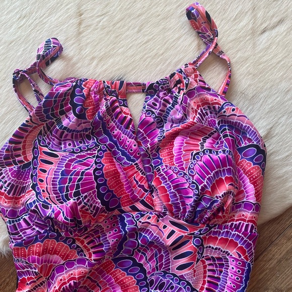 Krista brand one-piece swimsuit with a colorful, patterned top and black bottom - Picture 5 of 8